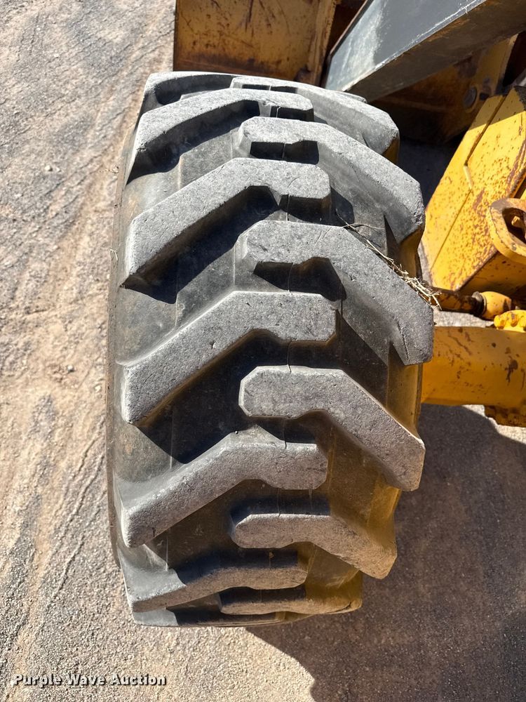 image for item EP0900 2009 John Deere 710J backhoe