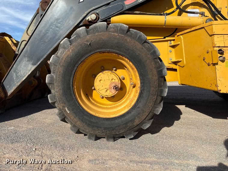 image for item EP0900 2009 John Deere 710J backhoe