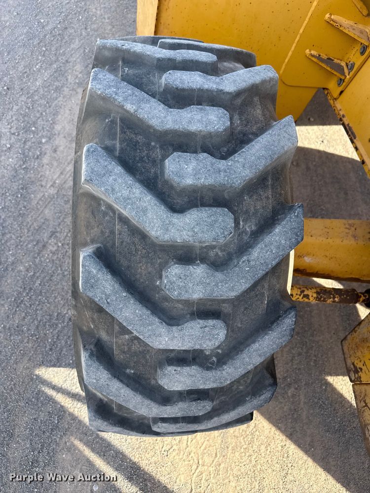 image for item EP0900 2009 John Deere 710J backhoe