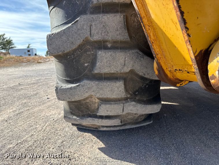 image for item EP0900 2009 John Deere 710J backhoe