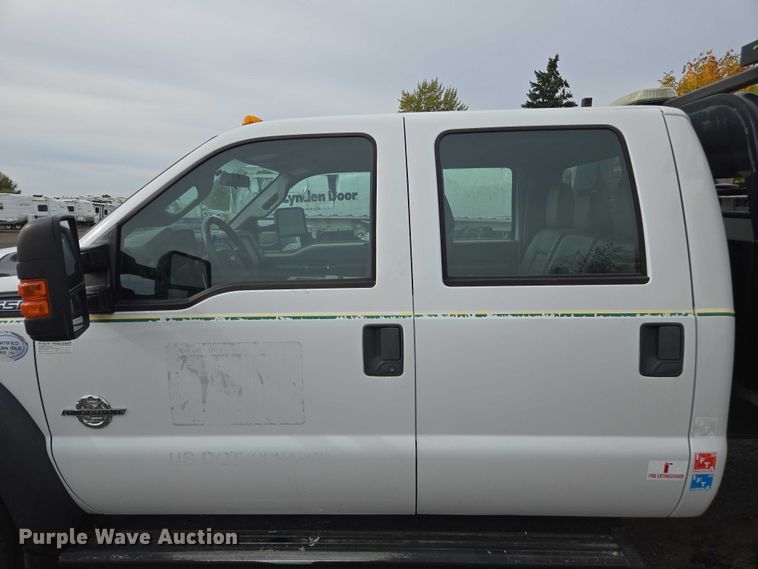 image for item YA1003 2015 Ford F550 Crew Cab flatbed truck