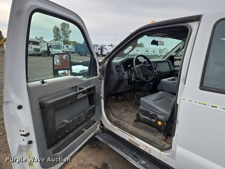 image for item YA1003 2015 Ford F550 Crew Cab flatbed truck