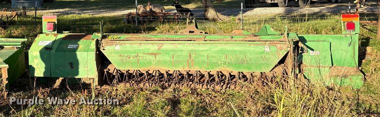 image for item EA7702 John Deere 995-5M swather / windrower head