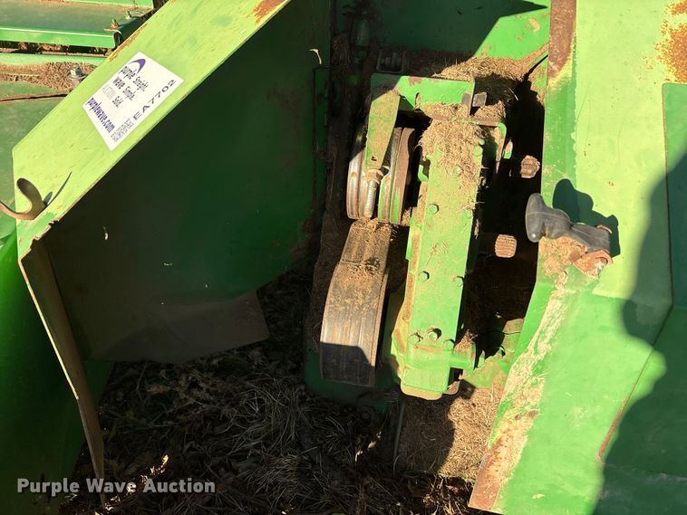 image for item EA7702 John Deere 995-5M swather / windrower head