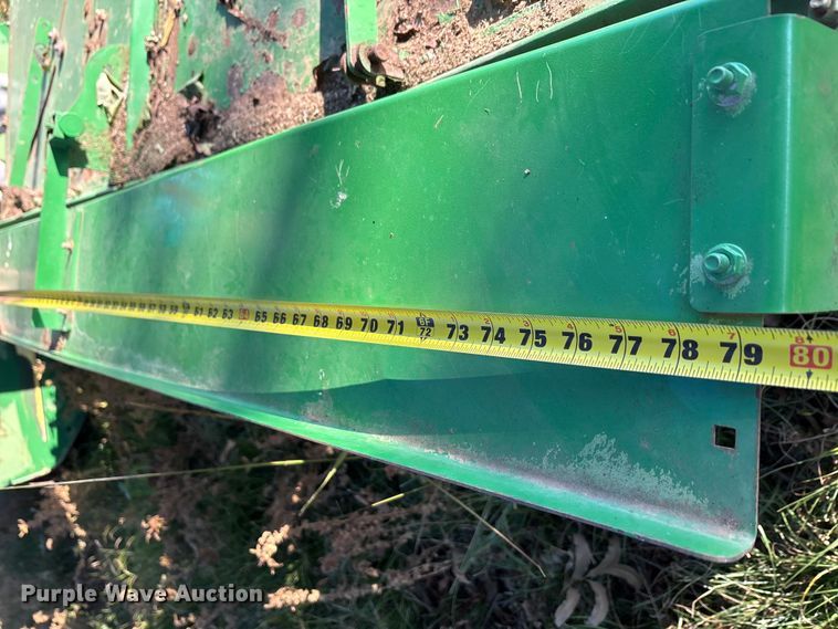 image for item EA7702 John Deere 995-5M swather / windrower head