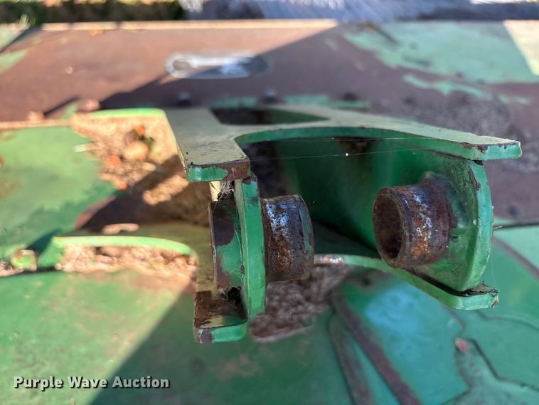 image for item EA7702 John Deere 995-5M swather / windrower head