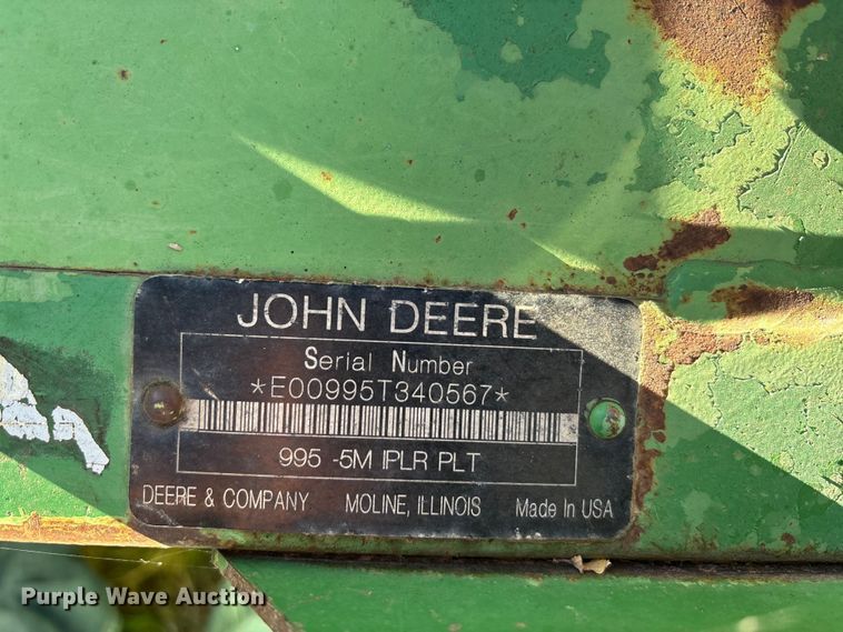 image for item EA7702 John Deere 995-5M swather / windrower head