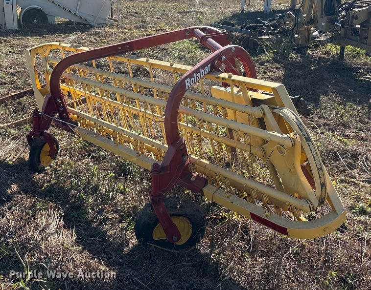 image for item EU0135 2014 New Holland Rolabar hay rake