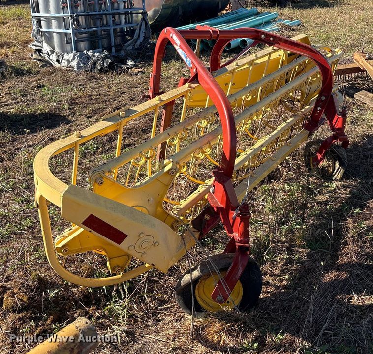 image for item EU0135 2014 New Holland Rolabar hay rake