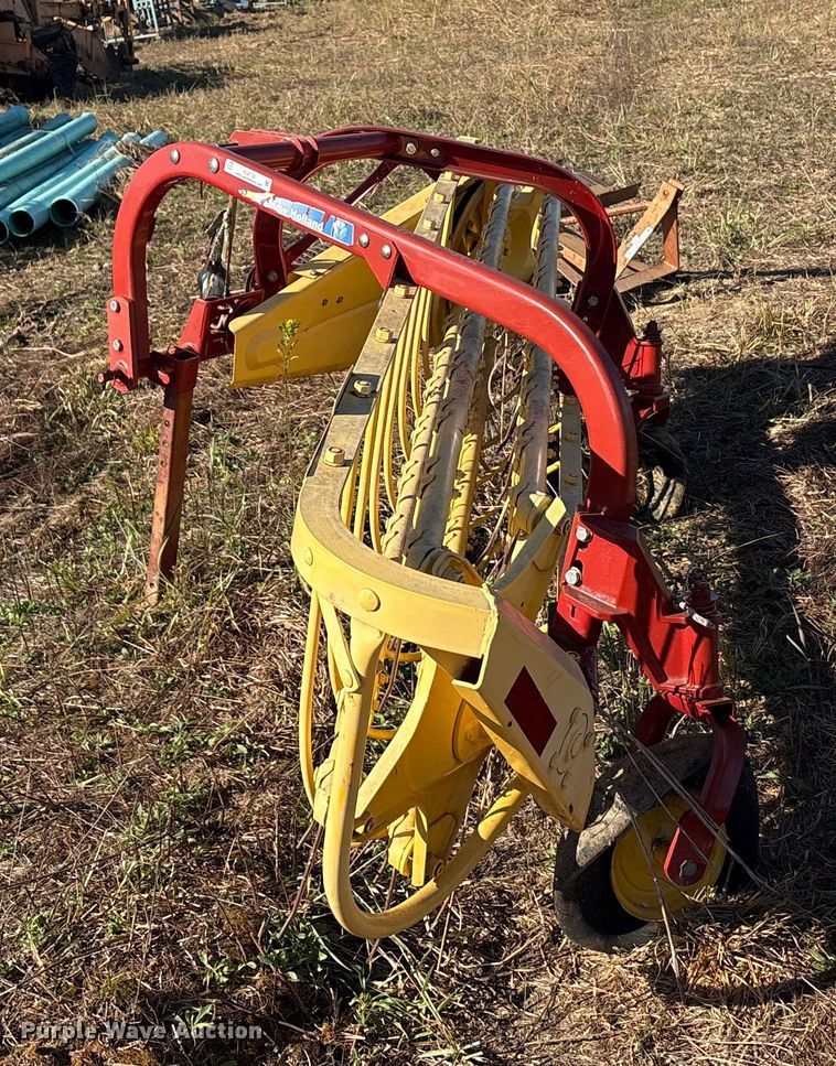 image for item EU0135 2014 New Holland Rolabar hay rake