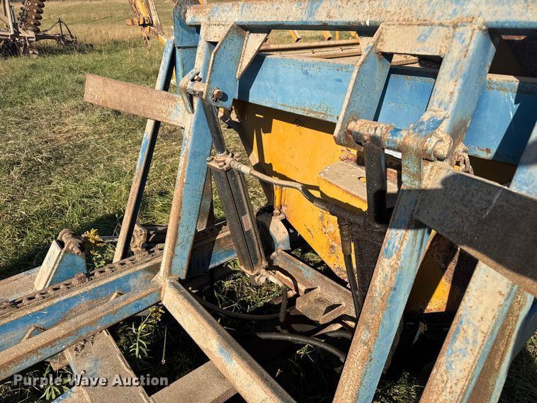 image for item FK0590 Haybuster 256 bale processor with feed wagon