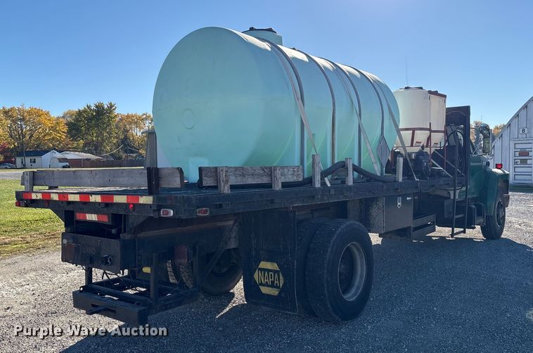 image for item FK1018 1988 Ford F700 flatbed truck