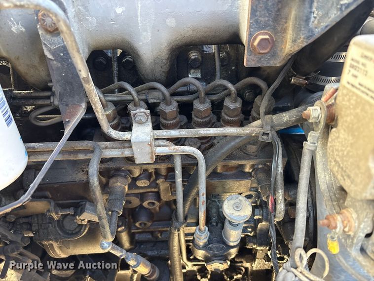 image for item FK1018 1988 Ford F700 flatbed truck