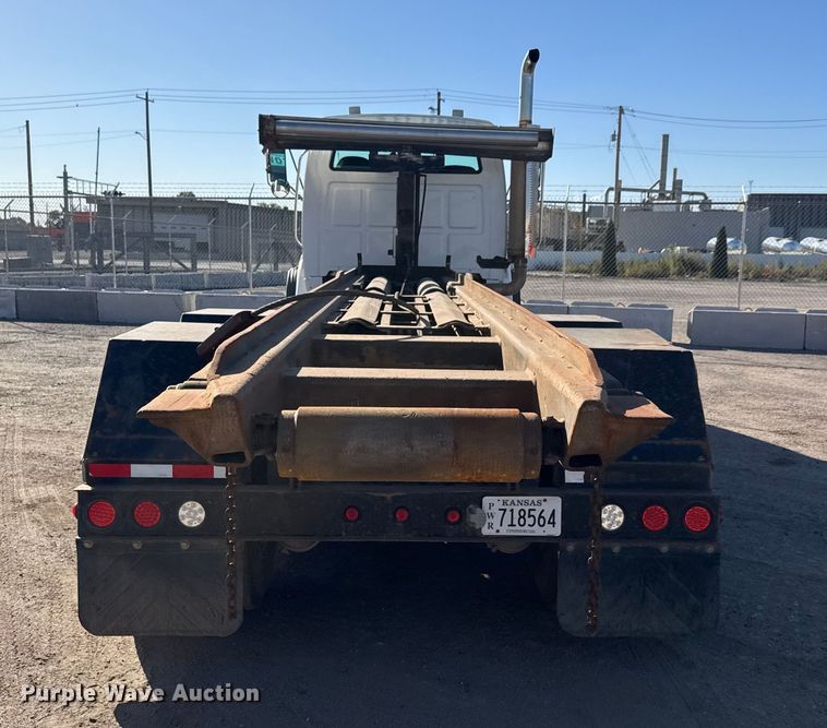 image for item EM8467 2007 Sterling LT9500 roll-off container truck