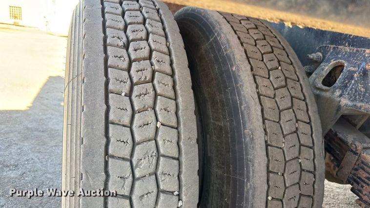 image for item EM8467 2007 Sterling LT9500 roll-off container truck