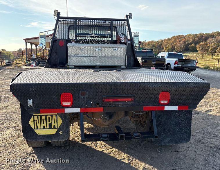 image for item ET7242 2000 International 4700 flatbed truck