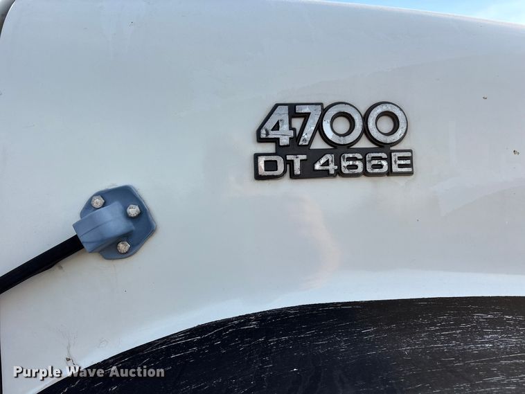 image for item ET7242 2000 International 4700 flatbed truck