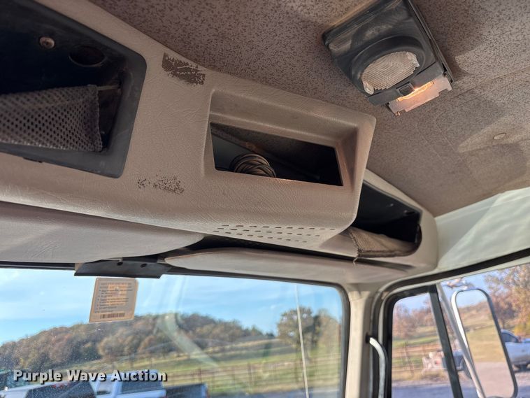 image for item ET7242 2000 International 4700 flatbed truck