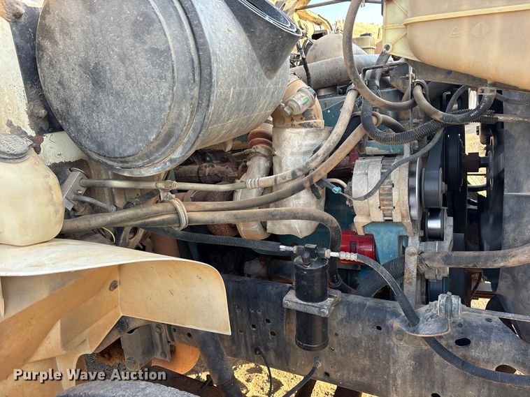 image for item ET7242 2000 International 4700 flatbed truck