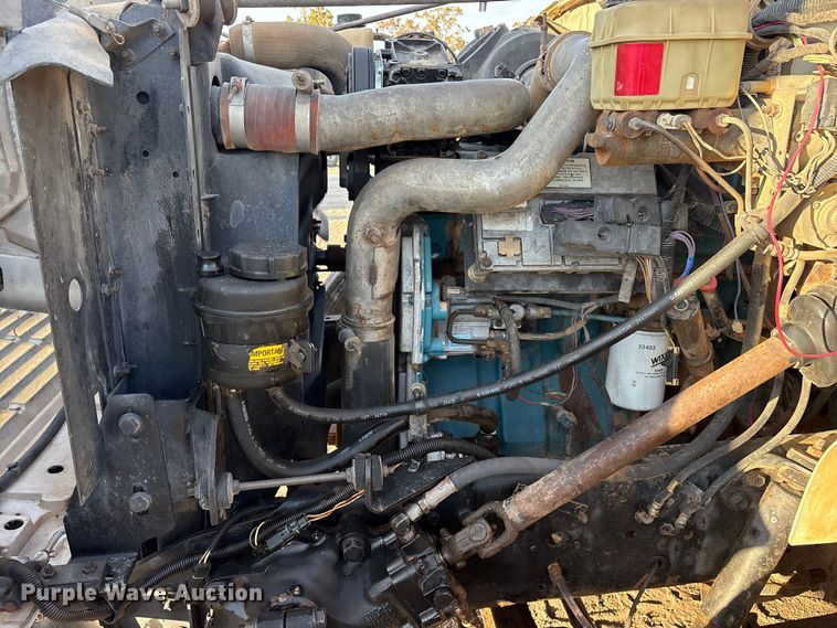 image for item ET7242 2000 International 4700 flatbed truck