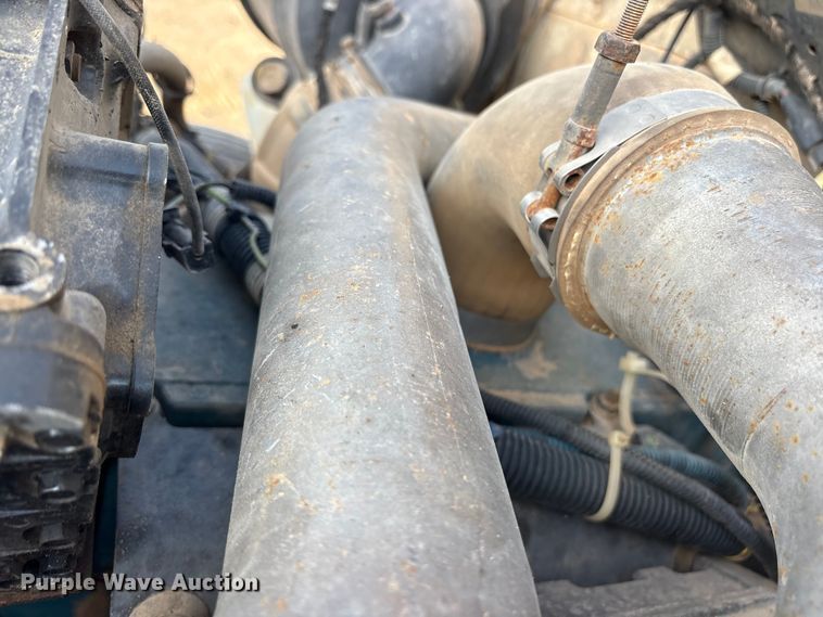 image for item ET7242 2000 International 4700 flatbed truck