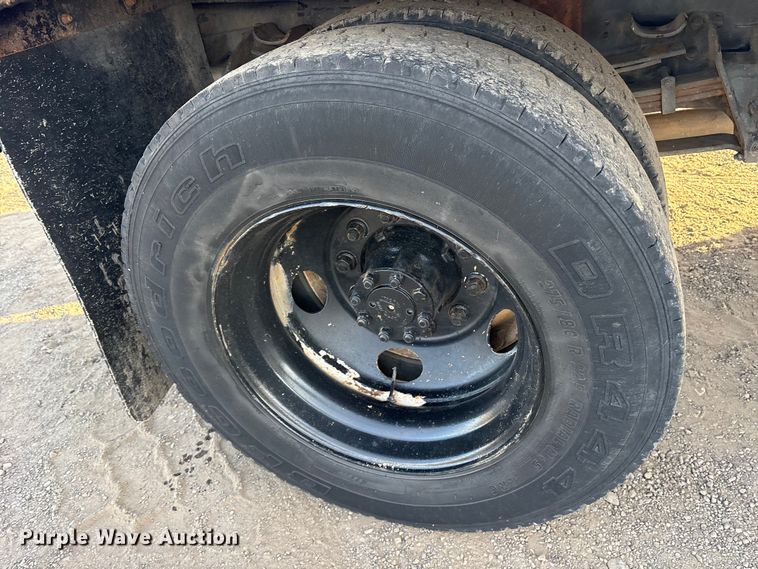 image for item ET7242 2000 International 4700 flatbed truck