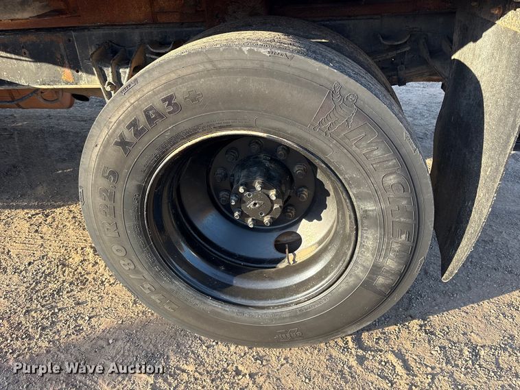 image for item ET7242 2000 International 4700 flatbed truck