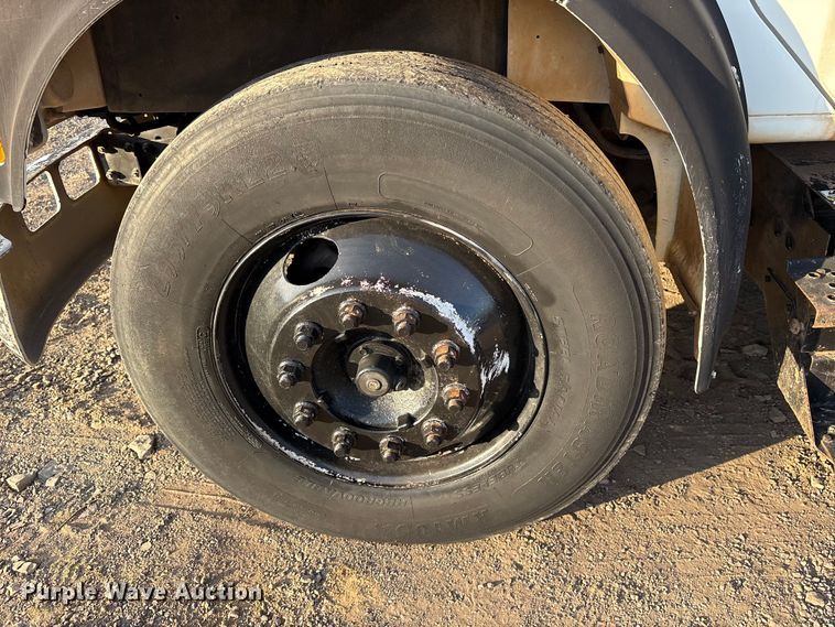 image for item ET7242 2000 International 4700 flatbed truck