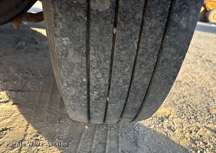 image for item ET7242 2000 International 4700 flatbed truck