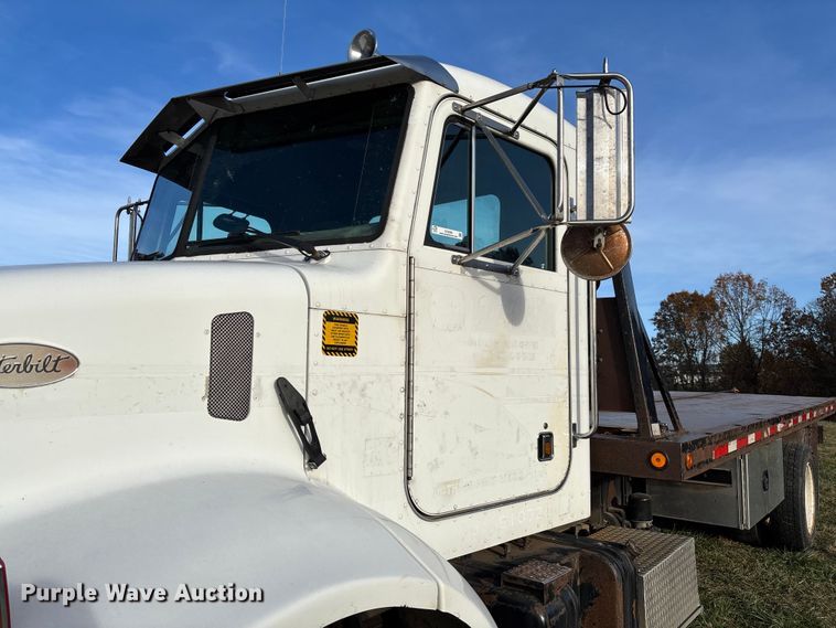 image for item EV3268 2000 Peterbilt 330 rollback truck