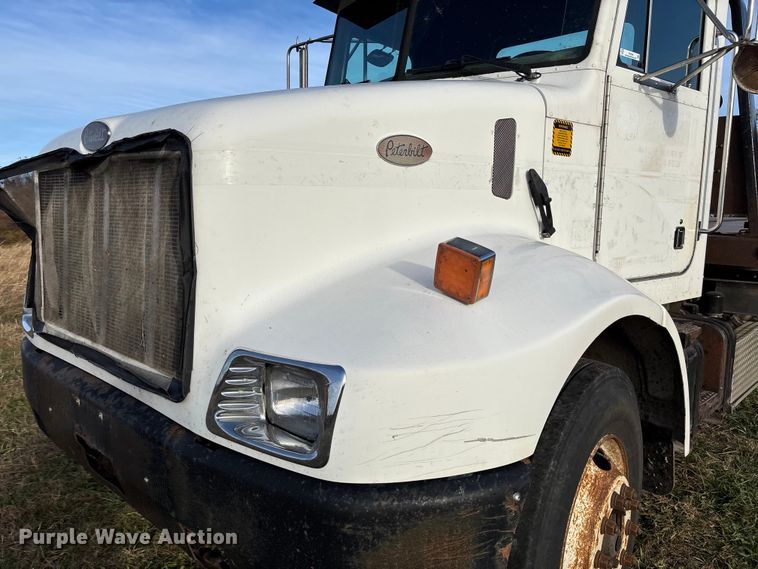 image for item EV3268 2000 Peterbilt 330 rollback truck