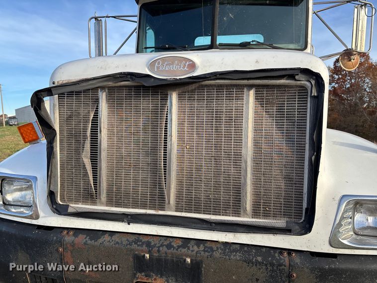 image for item EV3268 2000 Peterbilt 330 rollback truck