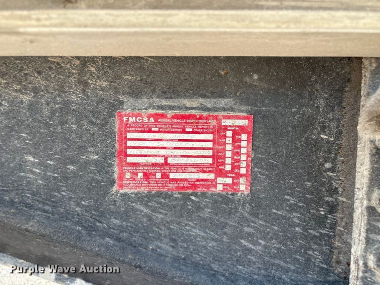 image for item FI0005 2005 Mac end dump trailer