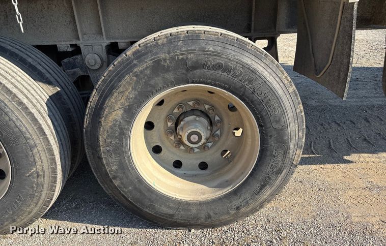 image for item FI0005 2005 Mac end dump trailer