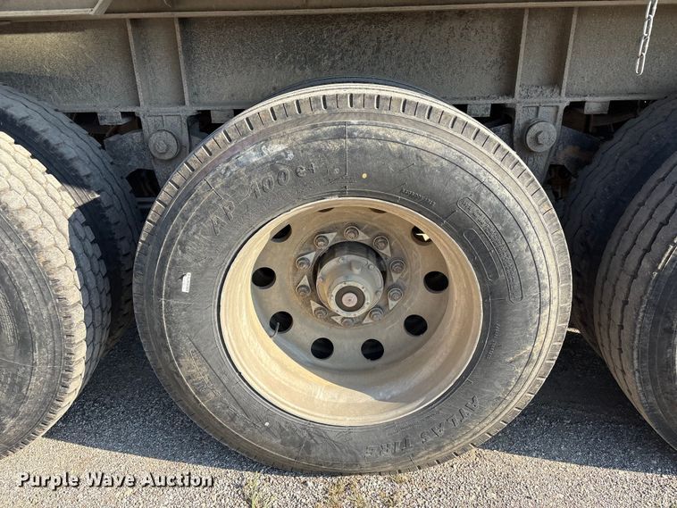 image for item FI0005 2005 Mac end dump trailer