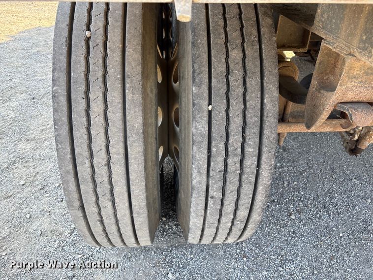 image for item FI0005 2005 Mac end dump trailer