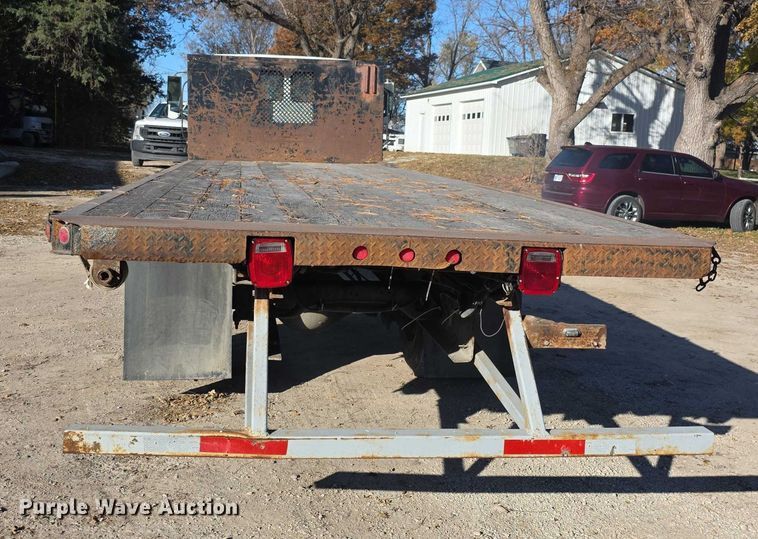 image for item FI0651 2000 Freightliner FL70 flatbed truck