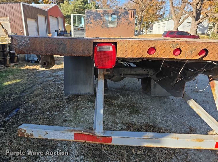 image for item FI0651 2000 Freightliner FL70 flatbed truck