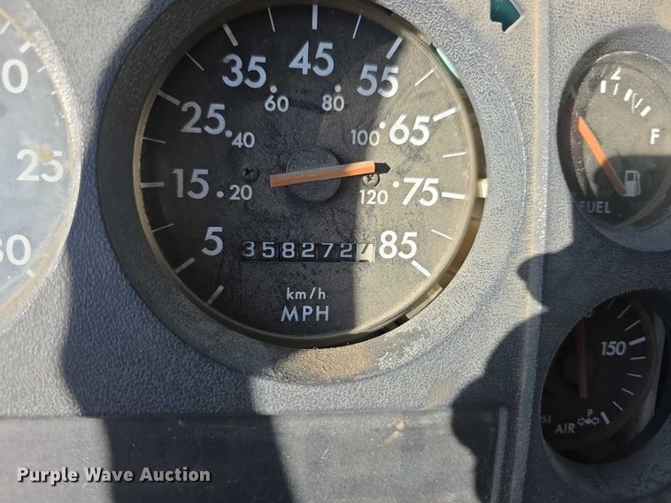 image for item FI0651 2000 Freightliner FL70 flatbed truck