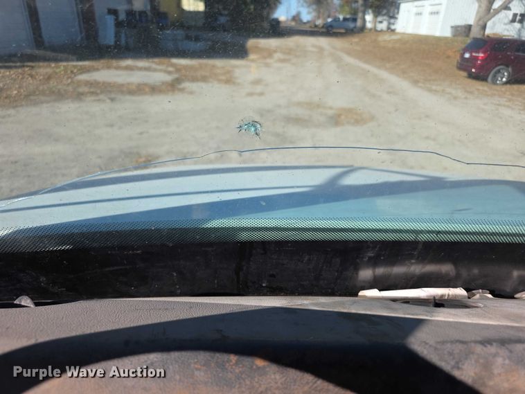 image for item FI0651 2000 Freightliner FL70 flatbed truck