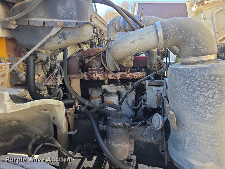 image for item FI0651 2000 Freightliner FL70 flatbed truck