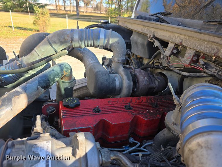 image for item FI0651 2000 Freightliner FL70 flatbed truck