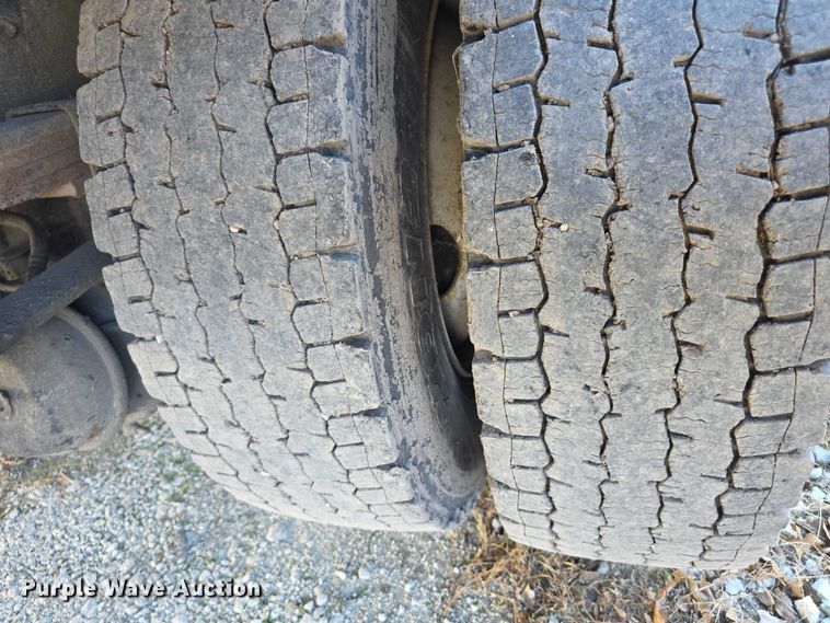 image for item FI0651 2000 Freightliner FL70 flatbed truck