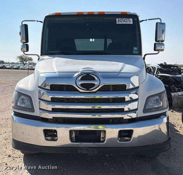 image for item YA1191 2023 Hino L7 Crew Cab rollback truck