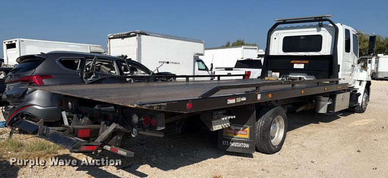 image for item YA1191 2023 Hino L7 Crew Cab rollback truck