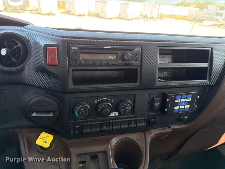 image for item YA1191 2023 Hino L7 Crew Cab rollback truck