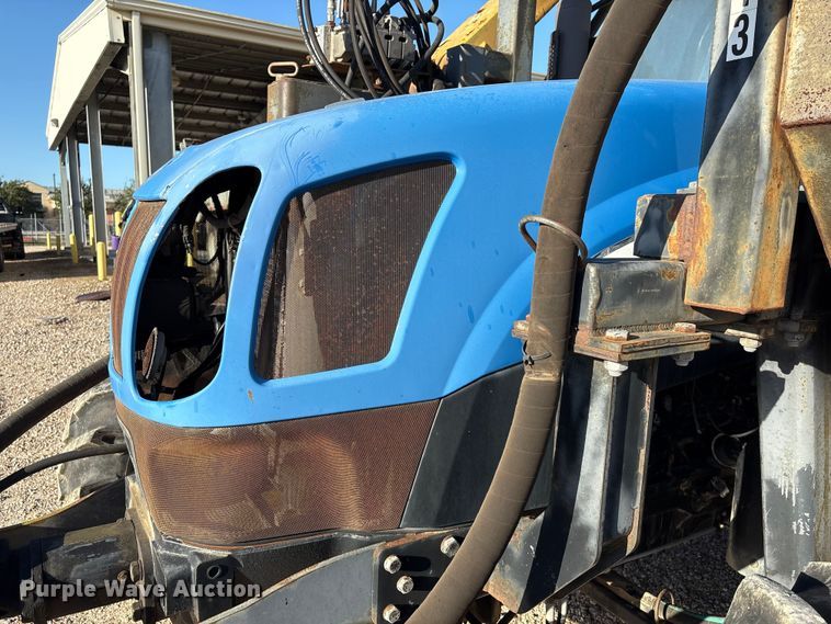 image for item EA7043 New Holland TS115A MFWD tractor