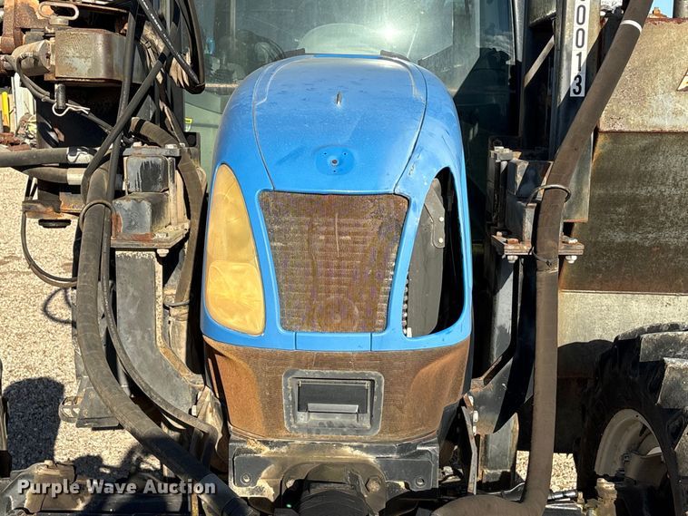 image for item EA7043 New Holland TS115A MFWD tractor