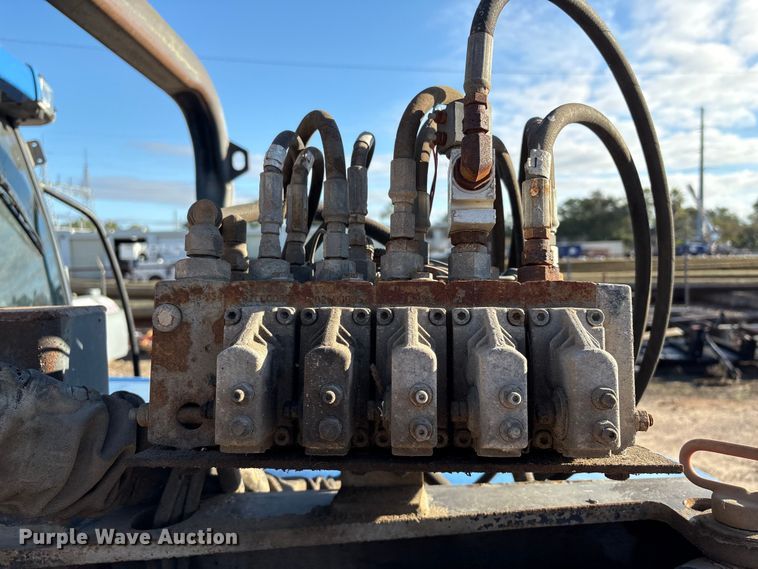 image for item EA7043 New Holland TS115A MFWD tractor