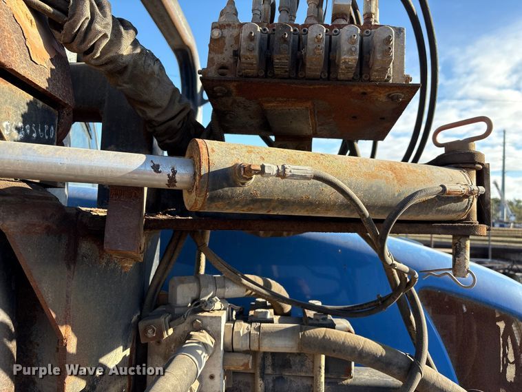 image for item EA7043 New Holland TS115A MFWD tractor